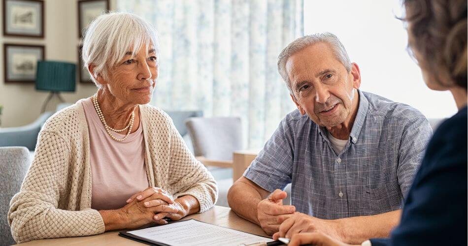 Real estate agents in Brackenfell. Estate agent with clients decoding Fica