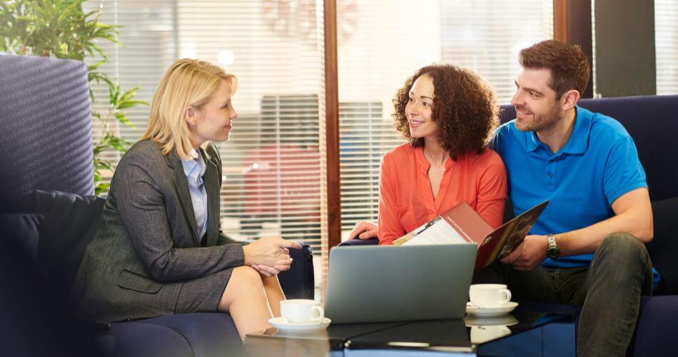 Sole Mandate in Brackenfell. Real estate agent explaining the details of a sole mandate to homeowners