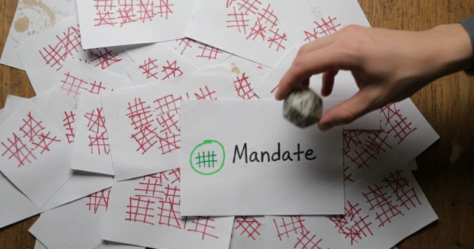 Performance psychology for real estate agents. Hand rolling a die on real estate lead tally sheet.