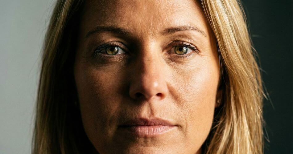 Psychology Of Real Estate Negotiation. Close up of real estate agent maintaining intense eye contact.