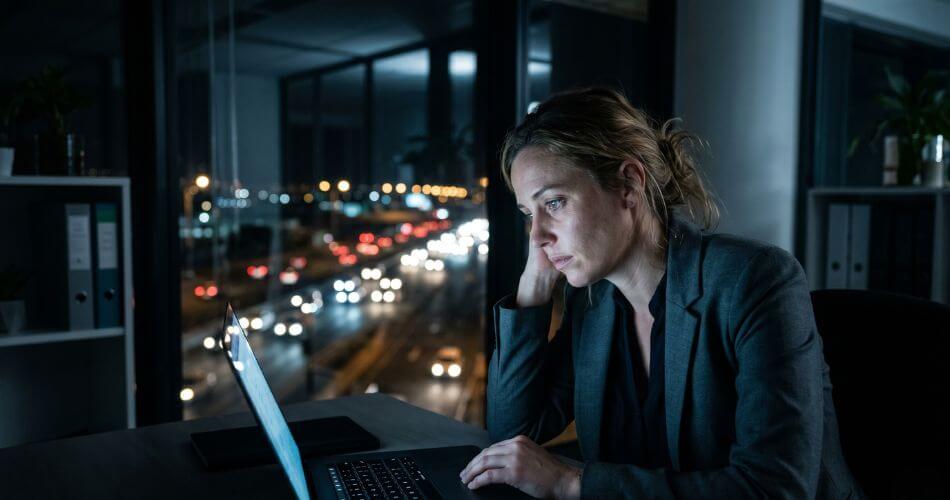 How To Find Your Calling In Life. Exhausted woman working late on laptop.
