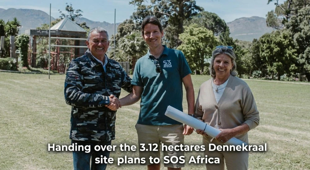 Brackenfell Real Estate Expert. Andre Swart shakes hands with SOS Africa Founder Dr Matt Crowcombe