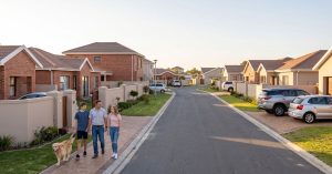 Living in Protea Hoogte Brackenfell. A family walking in Protea Hoogte, Brackenfell, showing suburban safety